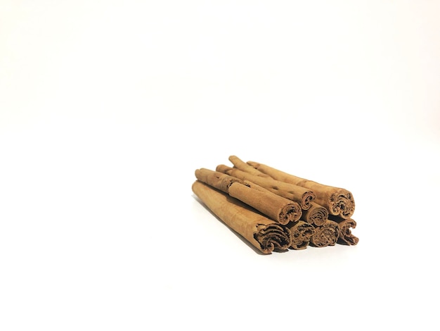 Fragrant cinnamon sticks on a white background