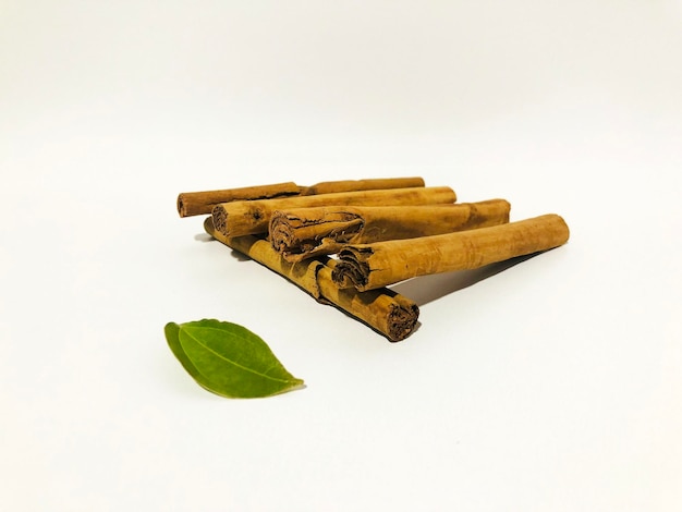 Fragrant cinnamon sticks on a white background