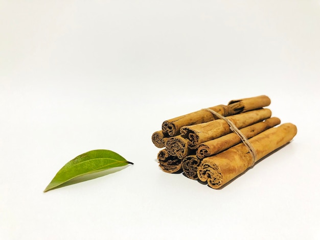 Fragrant cinnamon sticks on a white background