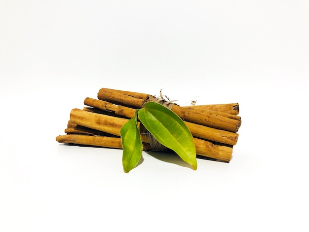 Fragrant cinnamon sticks on a white background