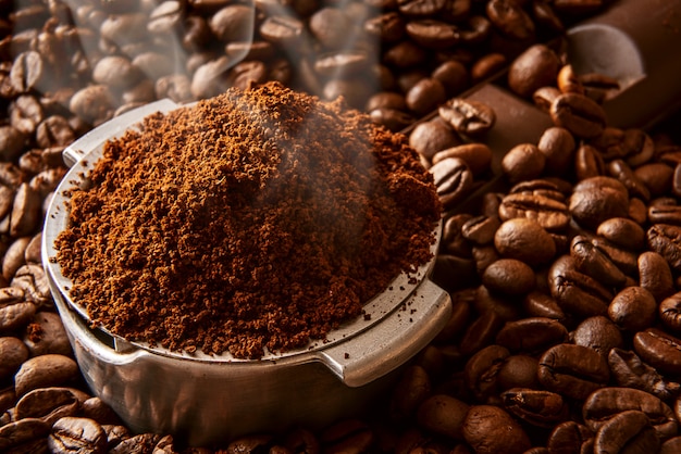 Fragrant ground coffee poured into the holder