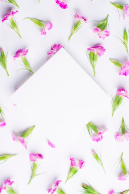 Frame of flowers laid out on the table