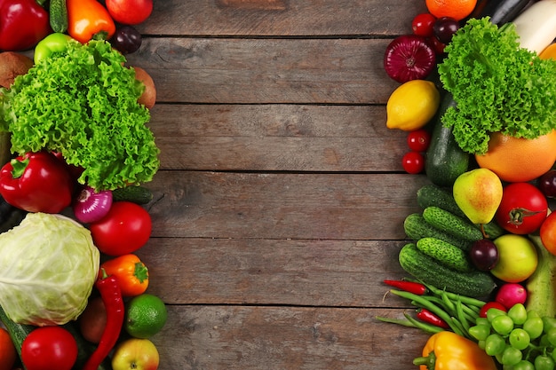 Frame of fresh vegetables on wooden