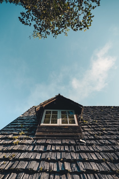 A Frame House In the summer morning before the autumn leaves