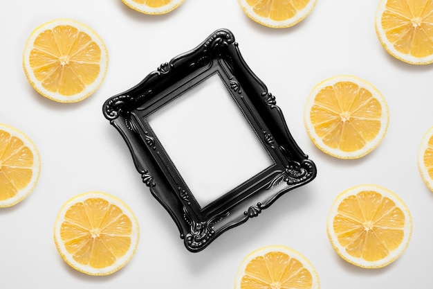 The frame with copy space is decorated with lemons