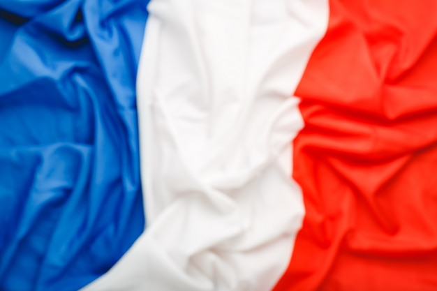 Photo france flag background blurred for design. french national flag as symbol of democracy, patriot. closeup texture flag france.stock photo