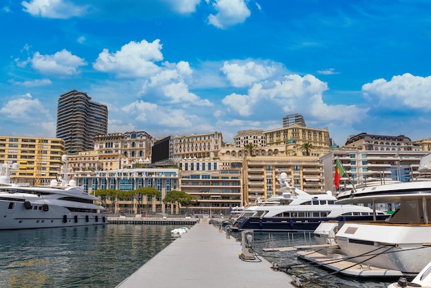 France French Riviera Monte Carlo marina with luxury yachts and cars in Monaco bay