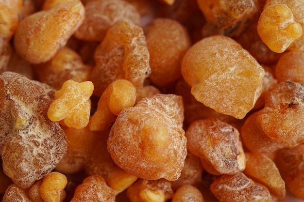 Frankincense or olibanum aromatic resin isolated on white background used in incense and perfumes