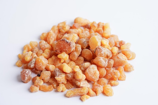 Frankincense or olibanum aromatic resin isolated on white background used in incense and perfumes