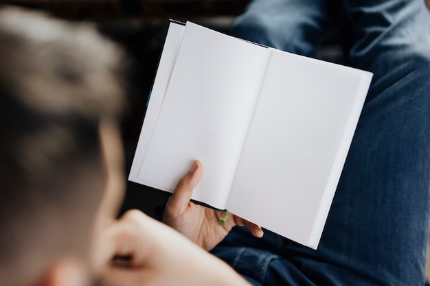 Freelancer casually reading a book