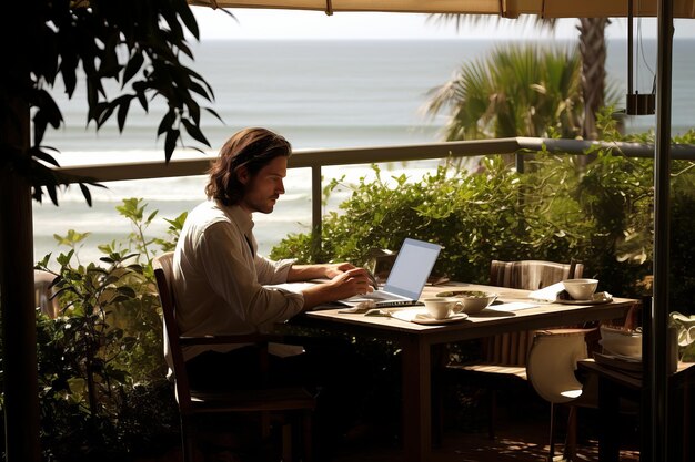 Freelancer working on laptop by the sea with gorgeous palm trees in the background