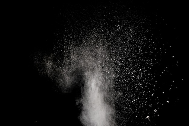 Freeze motion explosion of white powder.