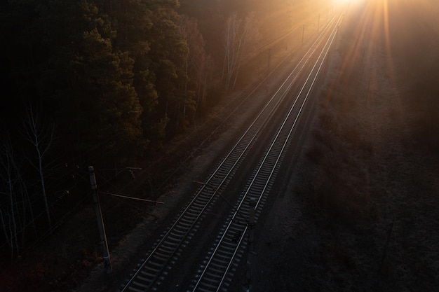 Freight train at high speed, top view, motion blur. Drone view.