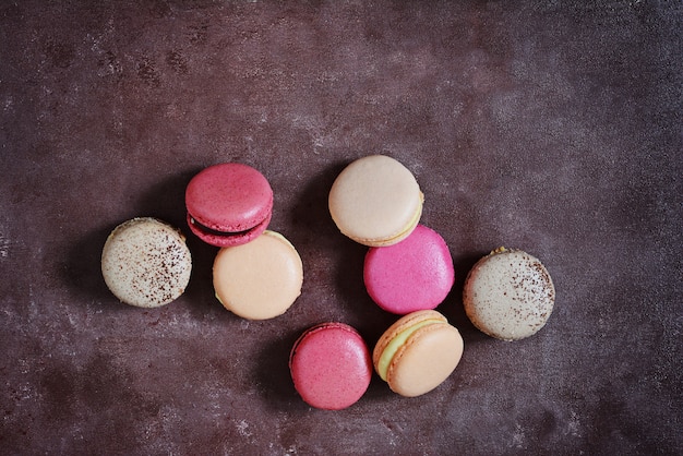 French assorted macarons cakes on a gray background