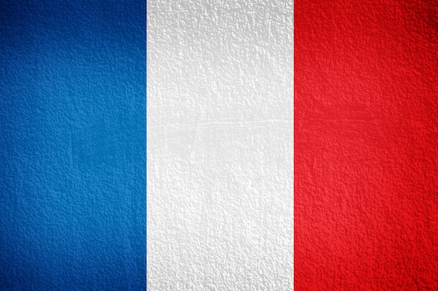 French flag painted on grunge wall