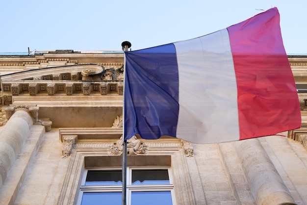 French flag tricolor red white blue sign on entrance city hall of town in France