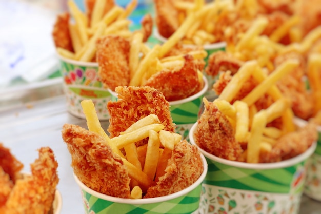 French fries and fried chicken at market