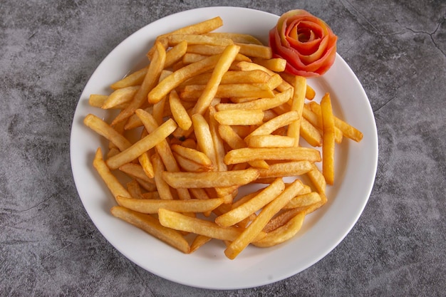 French fries on a rustic background