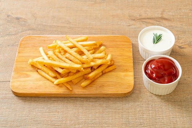 French fries with sour cream and ketchup