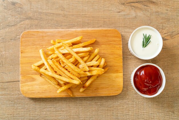 French fries with sour cream and ketchup