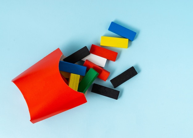 French fry concept with a colorful wooden cuboid shape.