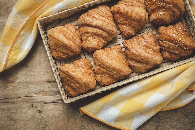 French Homemade fresh croissants on wooden table