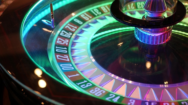 French style roulette table, money playing in Las Vegas, USA. Spinning wheel, black and red sectors