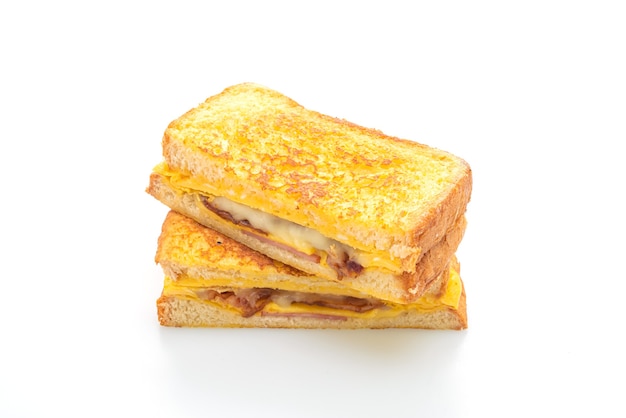 French toast ham bacon cheese sandwich with egg isolated