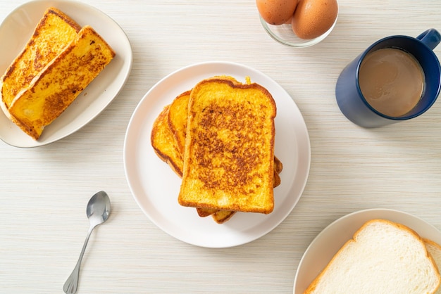 French toast on white plate for breakfast