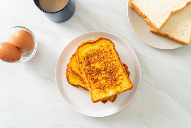 French toast on white plate