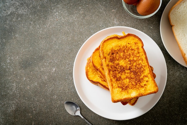 French toast on white plate