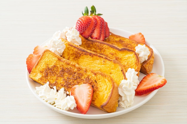 French toast with fresh strawberry and whipping cream