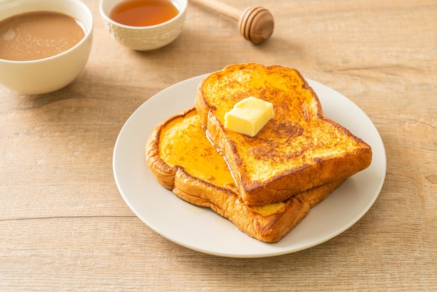 French toasted with butter and honey