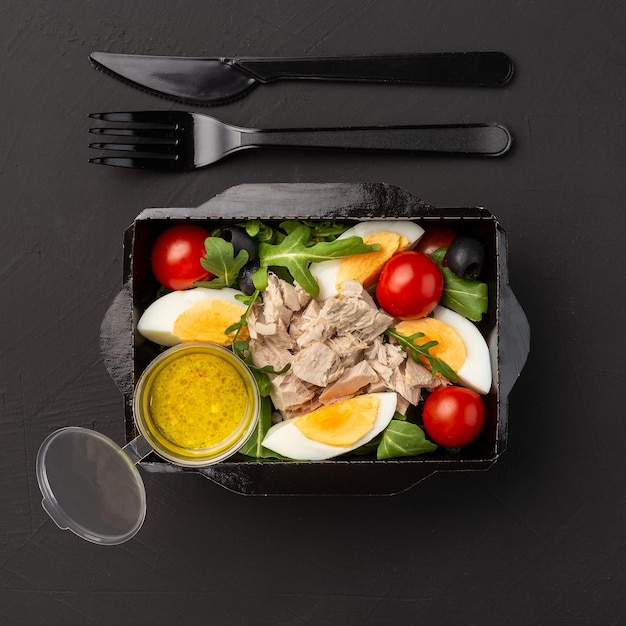 French tuna salad Nicoise in a takeaway box  Top view