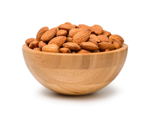 Fresh almonds nut in wooden bowl