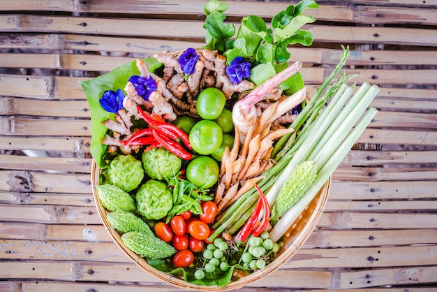 Fresh Asian herb and spicy ingredients food in bamboo basket