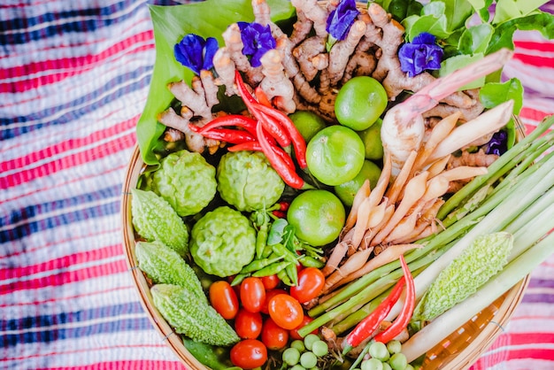 Fresh Asian herb and spicy ingredients food in bamboo basket