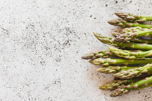 Fresh Asparagus Green fresh raw asparagus on rustic wooden table