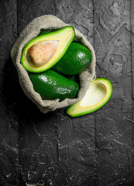 Fresh avocado in an old bag