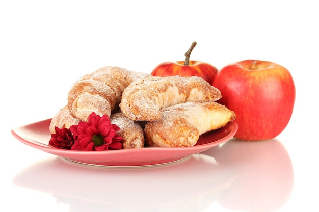 Fresh bagels with apples isolated on white