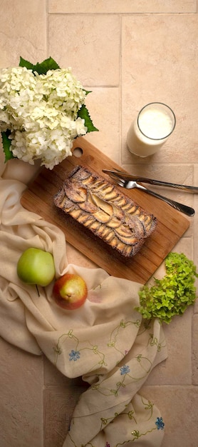 Fresh baked apple pie with glass of milk