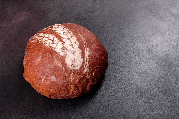 Fresh baked brown bread. Freshly baked traditional bread.