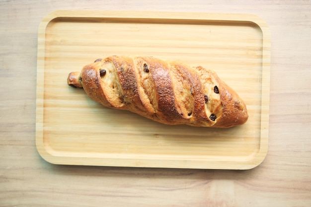 Fresh baked brown sugar pillow raisin on table