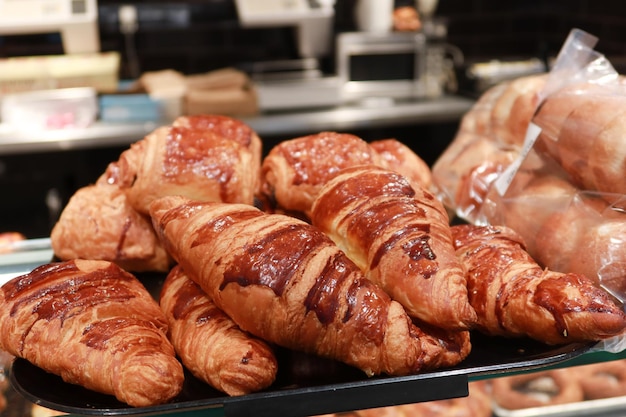 Fresh baked croissant on plate with copy space