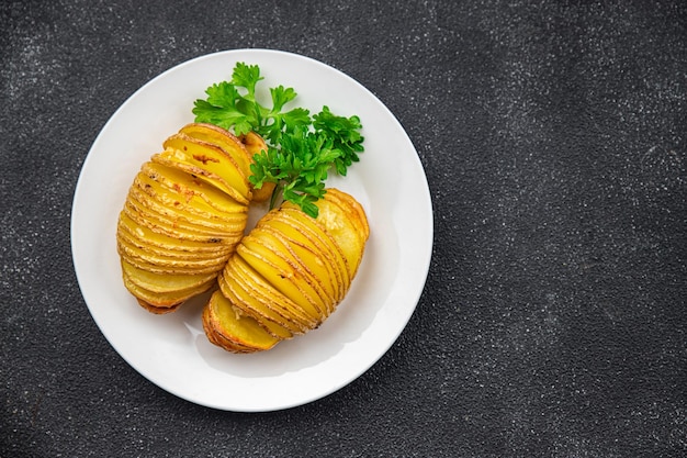 fresh baked potato slice accordion vegetable meal food snack on the table copy space food