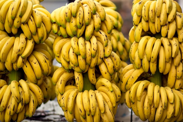 Fresh bananas at the fruit and vegetable market. Natural products concept