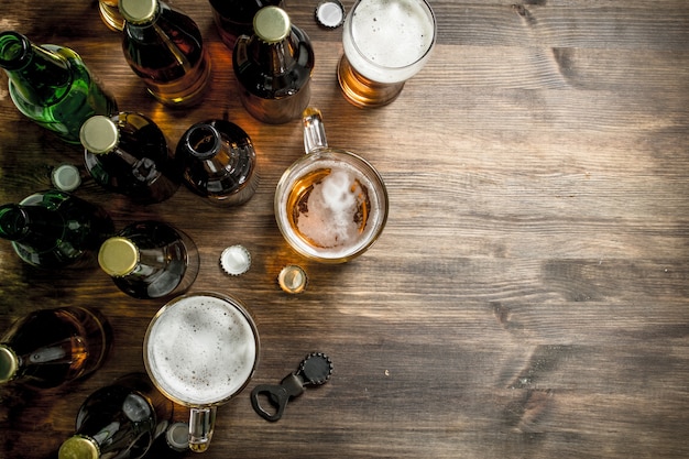 Fresh beer on wooden table.