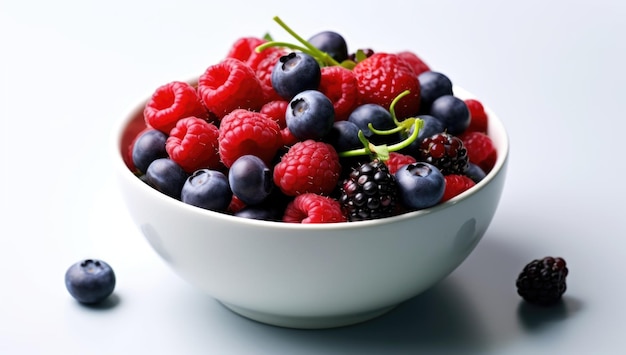 fresh berries in a bowl on white