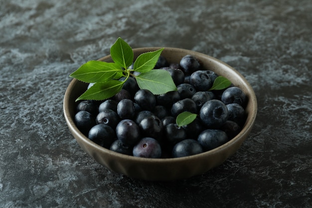 Fresh berry concept with blueberry on black smokey table