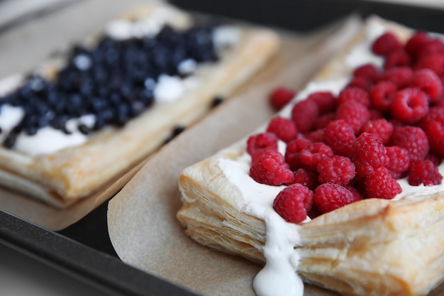 Fresh berry dessert on a baking tray